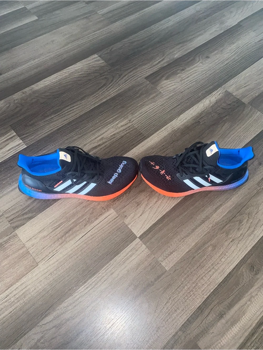 adidas Ultraboost men/women KEEP GOING Black Sneakers Blue and Orange Accents